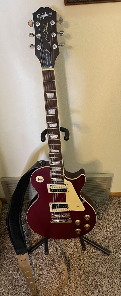 Epiphone Les Paul Traditional Pro IV Limited-Edition Worn Wine Red Electric Guitar.