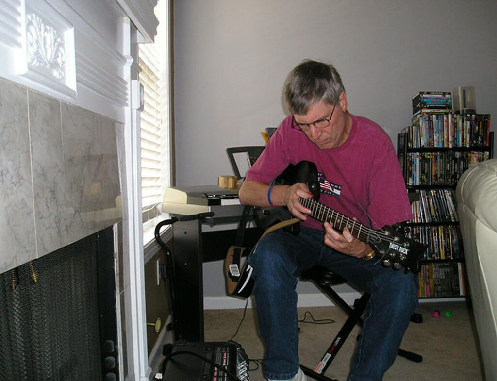 Paul plays his Daisy Rock "Rock Candy" Custom Special Electric Guitar, Black Satin, Pink Star.